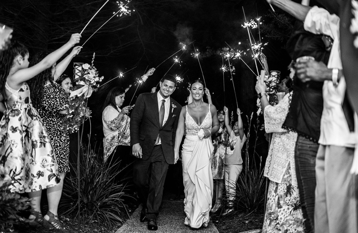wedding couple walking through sparkler send off